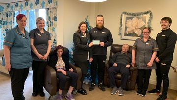 Forfar care home Residents receive early Christmas present from local powerlifters